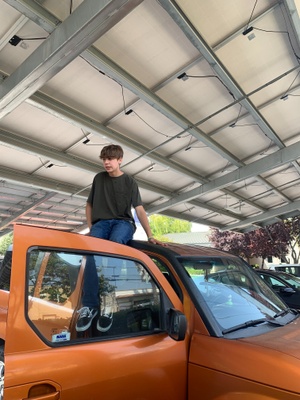 My friend Casey on top of my car