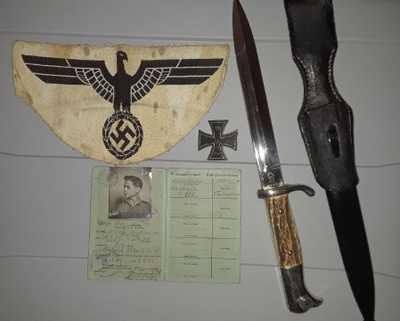 Bayonet dagger and personal information about the Nazi youth. 