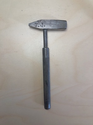 Grandpa's tack hammer with his initials