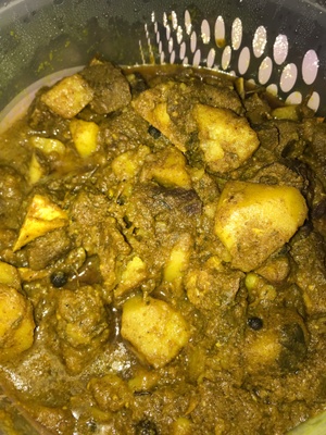 curry goat mixed with potatos
