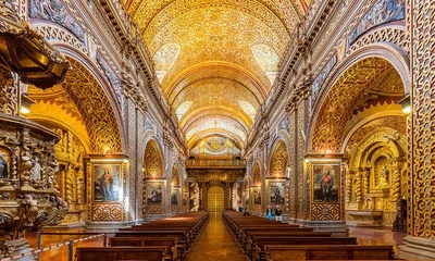 What i see here is that there are many portraits of jesus and maria  also the color of the church is yellow.