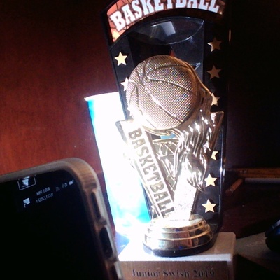 This is my basketball trophy standing.