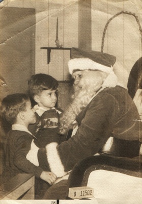 Russ (sticking tongue out at Santa) and brother, Marshal 1950