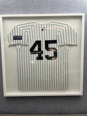 A signed Yankees jersey.