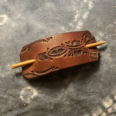 Leather hair strap with wooden stick
