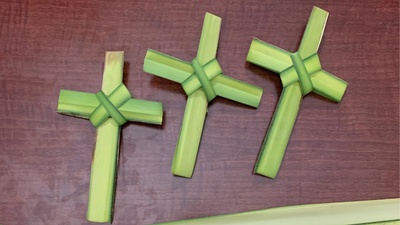 It is a picture of three palm crosses.